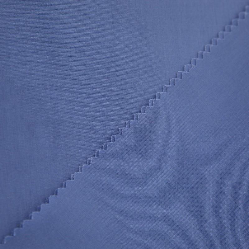    tecido_popeline_para_camisas_110g_para_fardas_algodao_poliester_alta_qualidade_e_conforto_azul_pastel_Texland